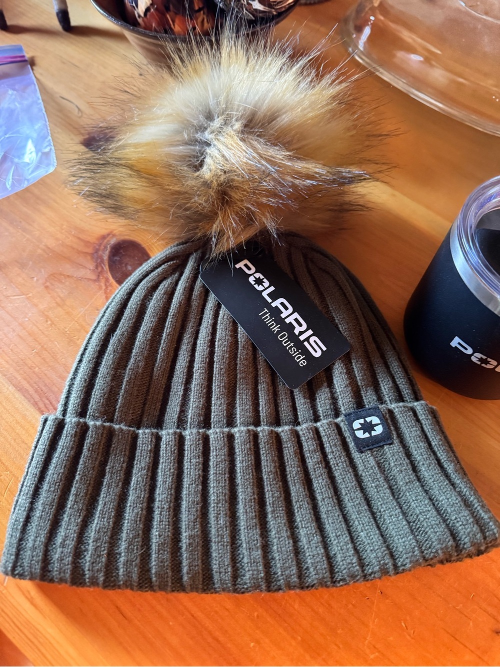 Polaris Adult Beanie with removal pompom.  Polaris insulated coffee mug.